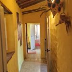 Corridoio delle camere arancio e rossa